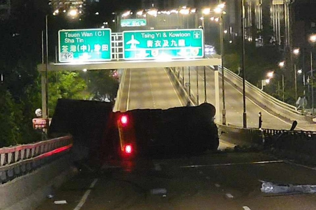A 66-year-old driver died after his container truck flipped over on Tsuen Wan Road flyover. Photo: Facebook/Bosco Chu