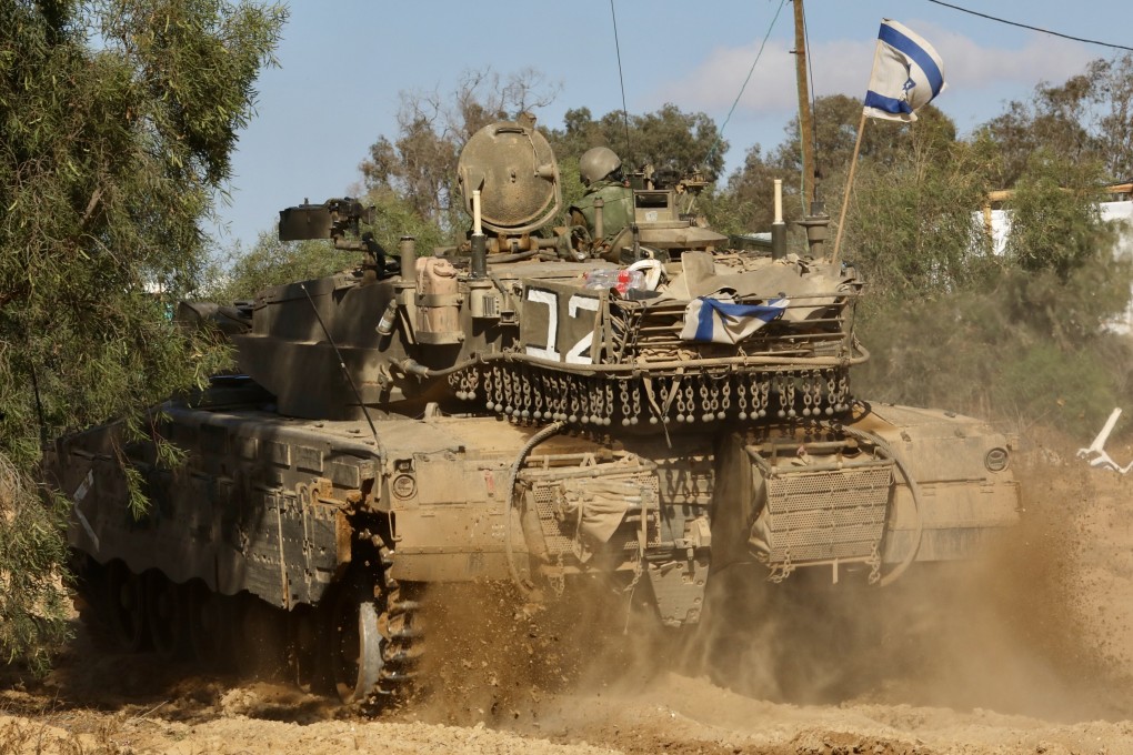 An Israeli tank is seen near the Shalom Kerem crossing in southern Israel, bordering the Gaza Strip. Photo: Xinhua