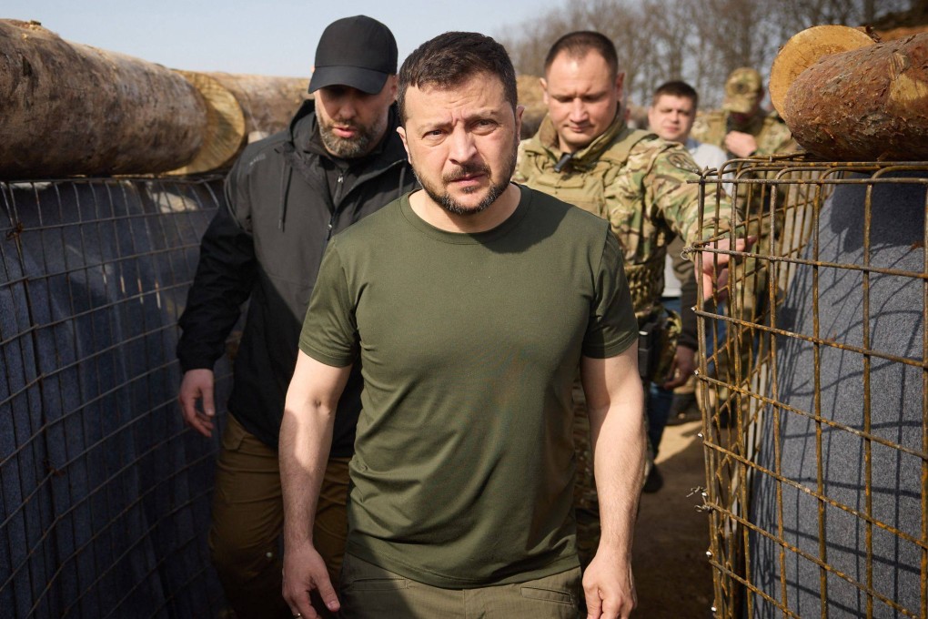 Ukraine’s President Volodymyr Zelensky visiting a construction site of a defence line in the Kharkiv region in April. Photo: Ukrainian Presidential Press Service via AFP