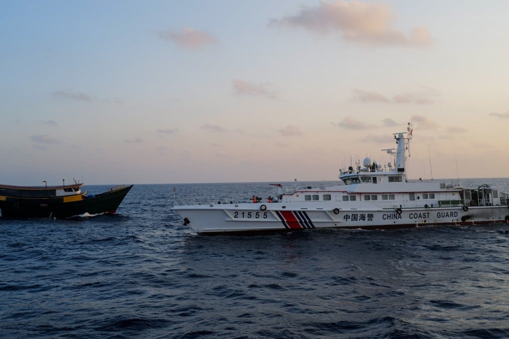 Chinese coastguard vessels try to block a civilian ship chartered by the Philippine Navy for a resupply mission for soldiers stationed at BRP Sierra Madre in the Second Thomas Shoal on March 23. Photo: Jeoffrey Maitem