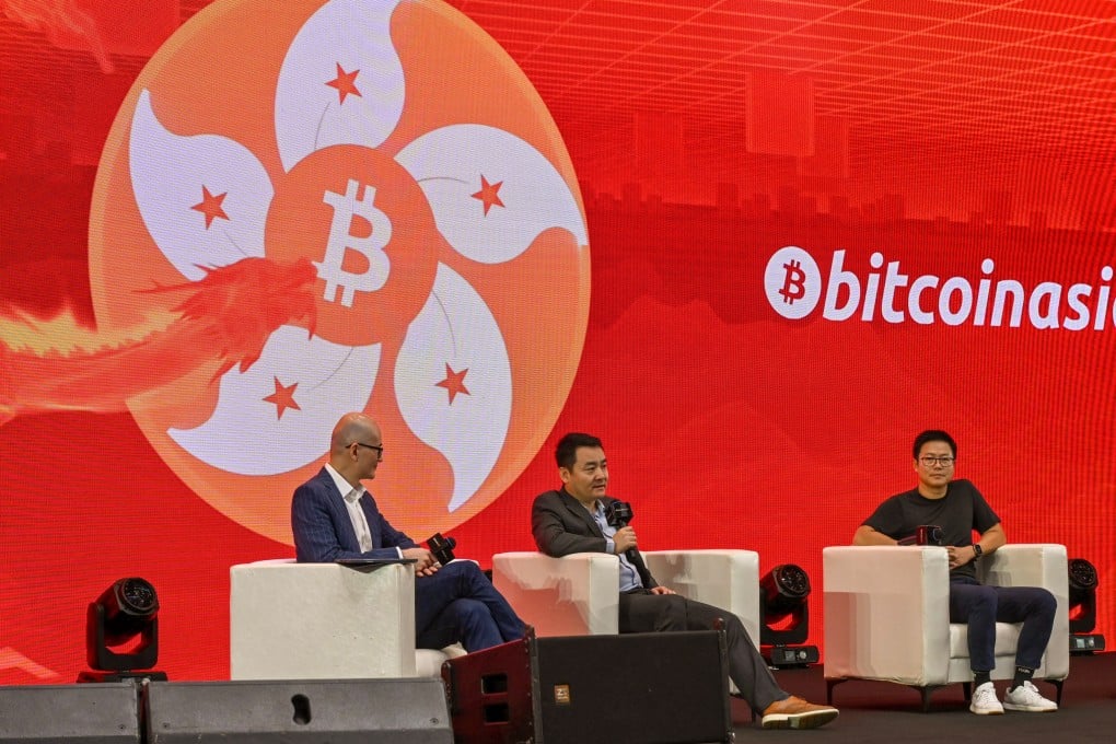 Harvest Global Investments CEO Han Tongli (centre) speaks during a panel discussion on Hong Kong’s spot bitcoin and ether exchange-traded funds at Bitcoin Asia on May 9, 2024. Photo: SCMP/Matt Haldane