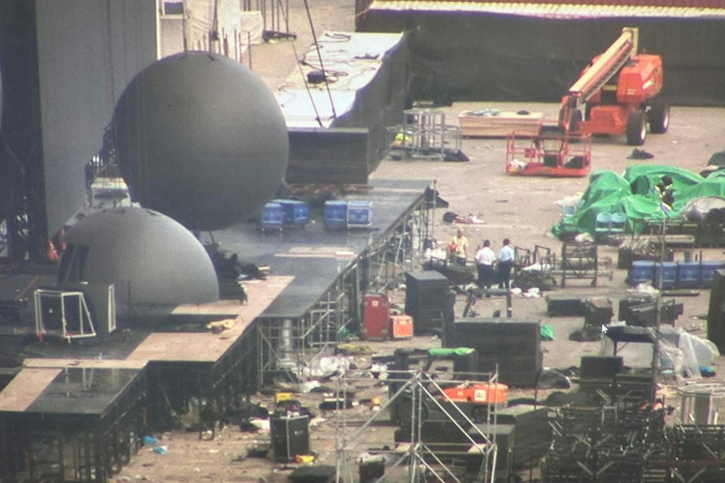 Works are under way to dismantle the stage used by Taiwanese rock band Mayday at the Central harbourfront. Photo: Handout