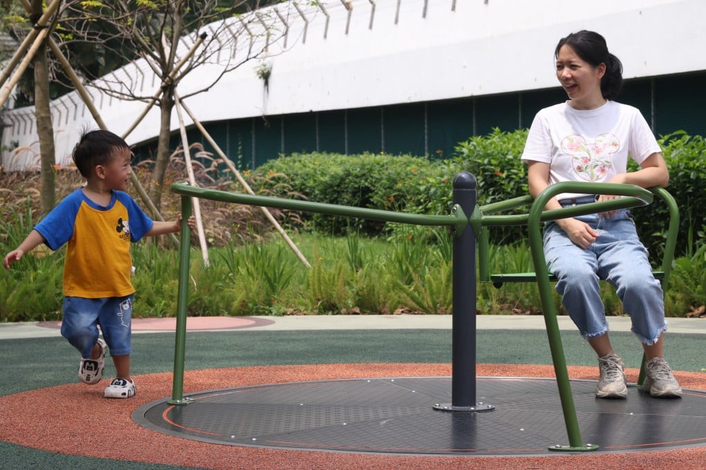 A boy and his mother at a park in Sham Shui Po on May 7. Despite the heavy attention on the deciling birth rate in Hong Kong and many other societies, barriers to motherhood and prejudice against working mothers make having children a difficult choice for many women. Photo: Yik Yeung-man