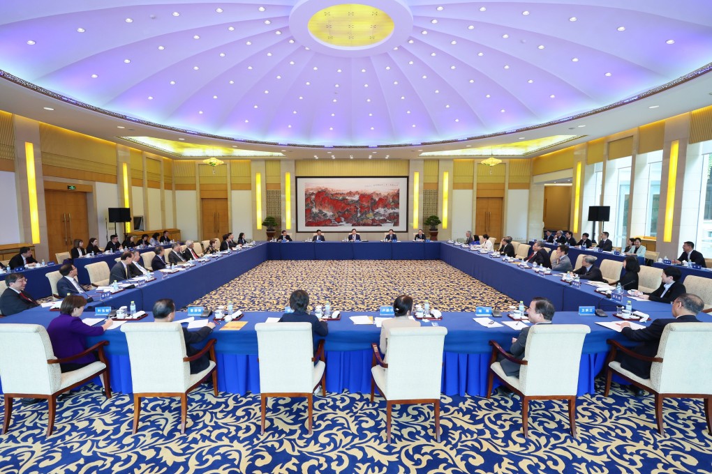 Xia Baolong, the director of the Hong Kong and Macau Affairs Office, meets Secretary for Education Choi Yuk-lin and representatives of 22 Hong Kong tertiary education bodies during their trip to Beijing. Photo: Handout