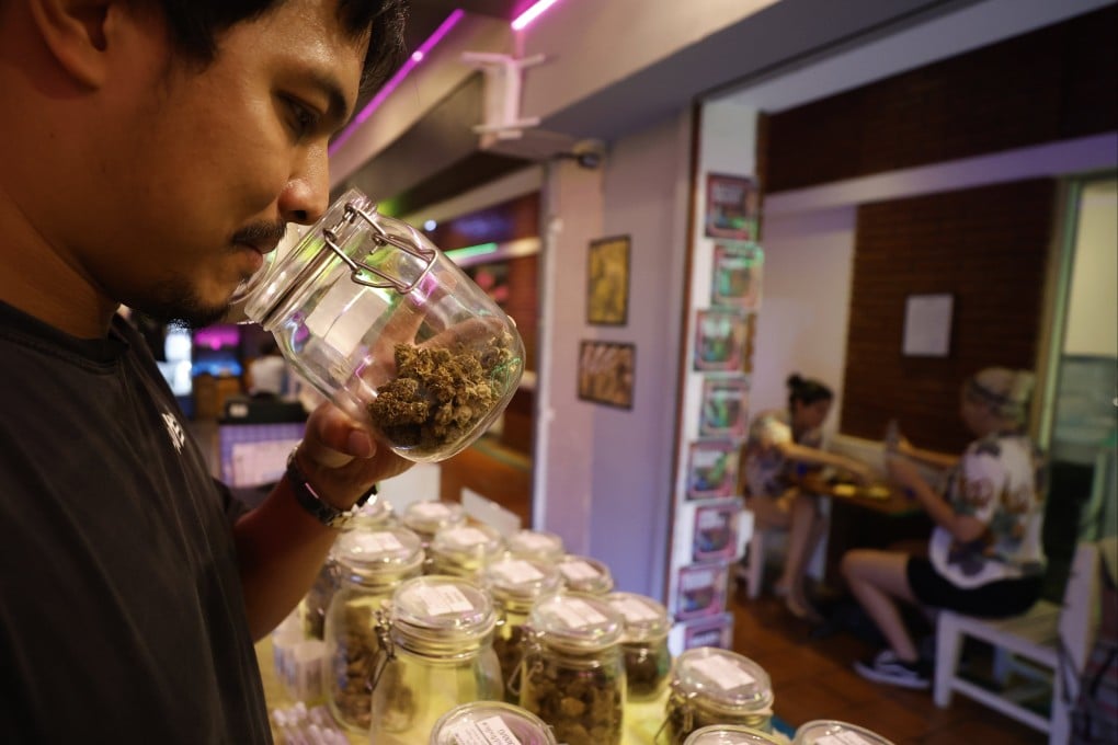 A vendor at a cannabis shop in the popular tourist area of Khaosan Road in Bangkok, Thailand, on Thursday. Photo: EPA-EFE