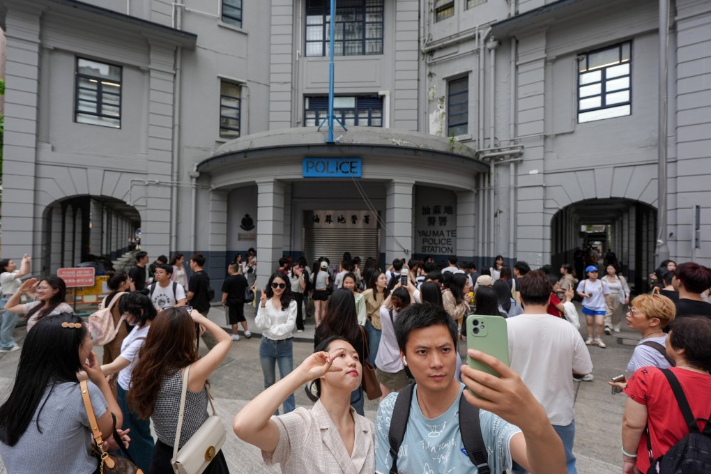 Visitors at Yau Ma Tei Police Station during “golden week”. Beijing has announced it will expand a solo traveller scheme for mainland visitors to Hong Kong, the second in three months. Photo: Eugene Lee
