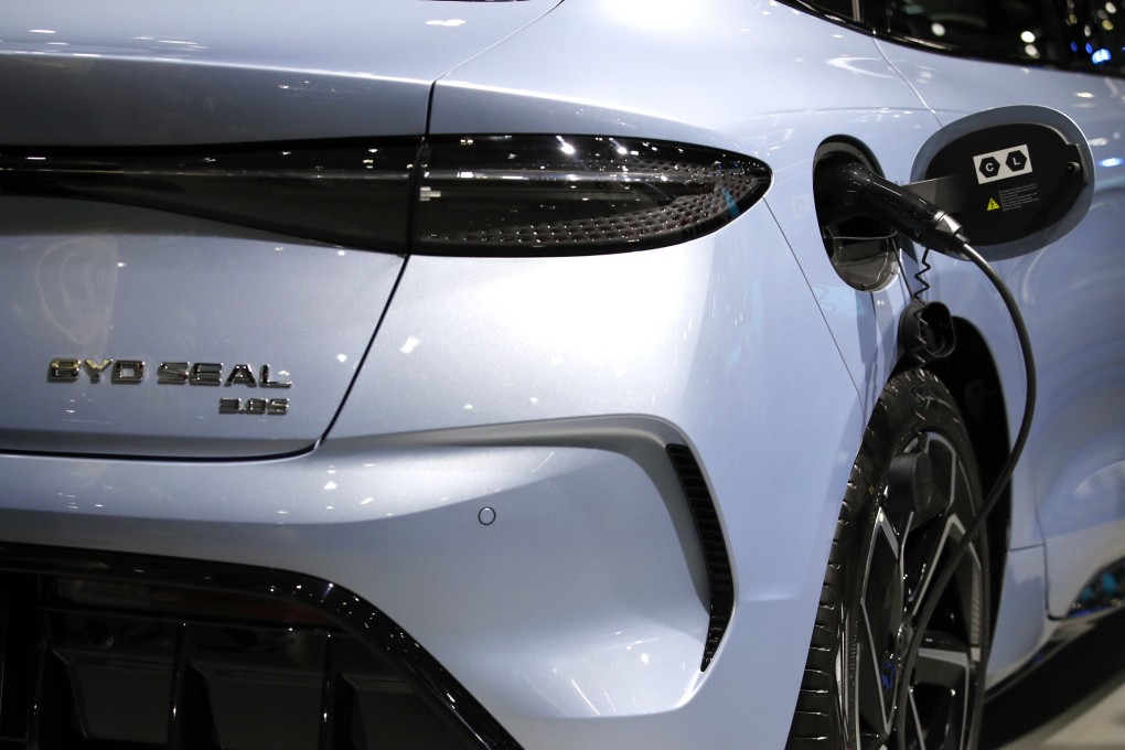 A vehicle from Chinese automaker BYD is seen charging at the Thailand International Motor Expo 2023. The US is set to hit China EVs with tariffs. Photo: EPA-EFE