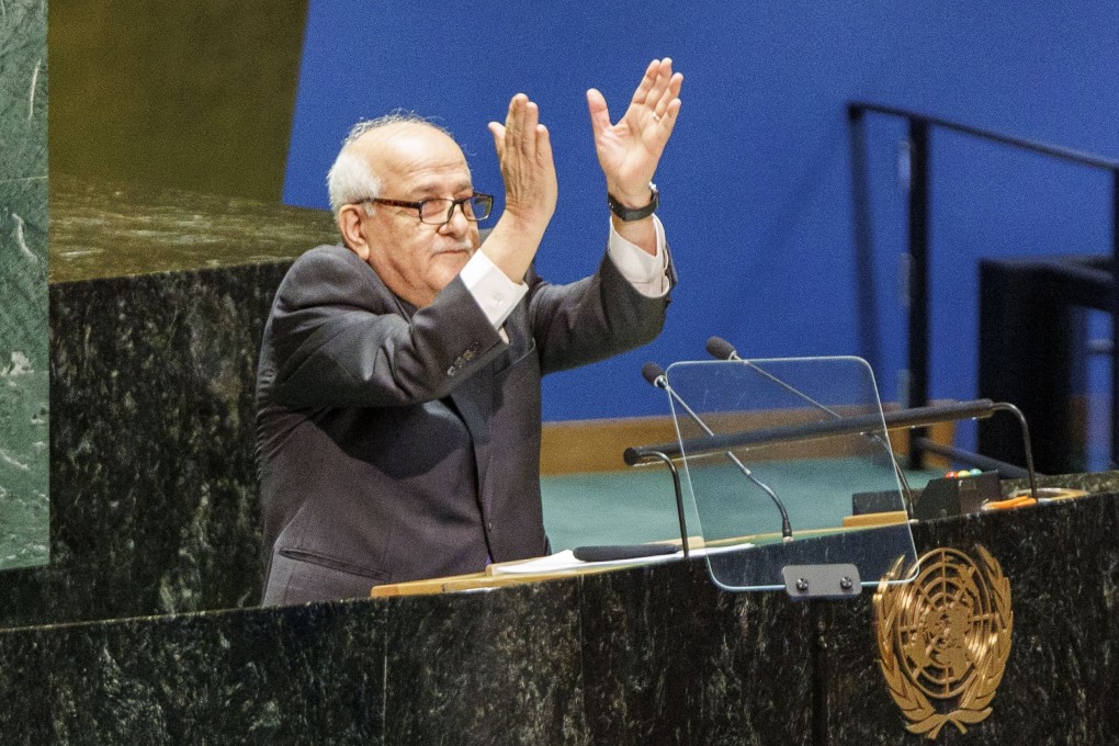 Permanent Observer of Palestine to the UN Riyad Mansour claps as the crowd reacts to his speech at the United Nations General Assembly in New York on Friday. Photo: EPA-EFE