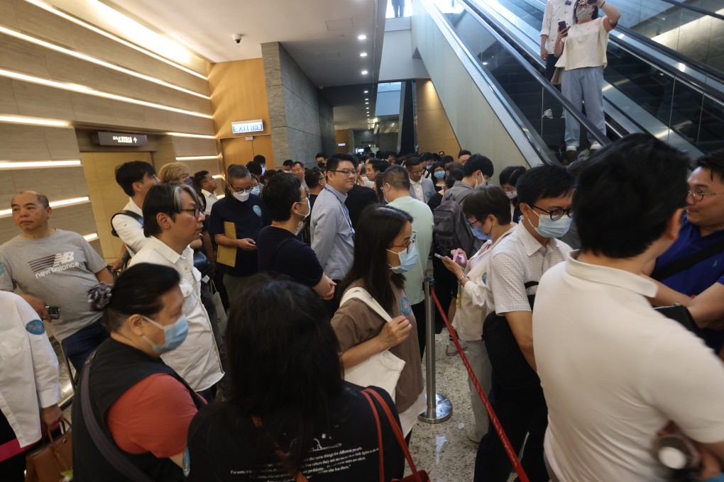 Buyers crowd the sales office of SHKP’s Yoho Hub II project in West Kowloon on Saturday. Photo: Jonathan Wong