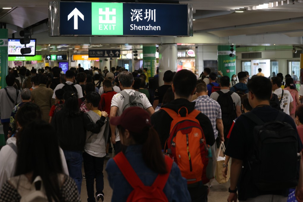 Travellers at the Lo Wu control point in Hong Kong head to Shenzhen during a recent holiday. Photo: Yik Yeung-man