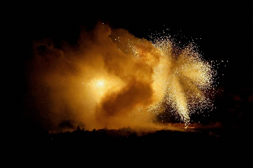 An explosion is seen over Gaza on Saturday. The UN says 1.4 million people have been sheltering in Rafah. Photo: Reuters