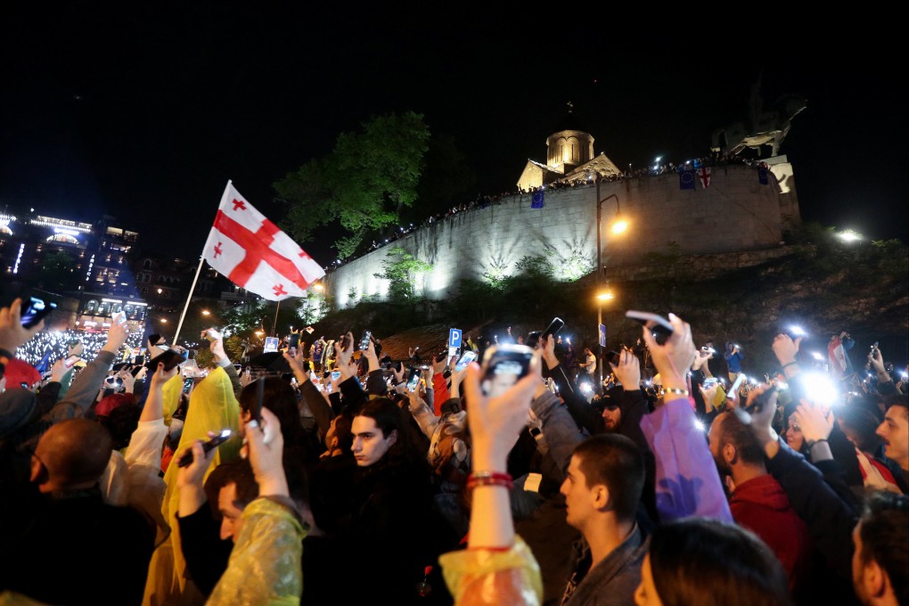 Demonstrators hold a rally to protest against a bill on “foreign agents” in Tbilisi, Georgia, on Saturday. Photo: Reuters