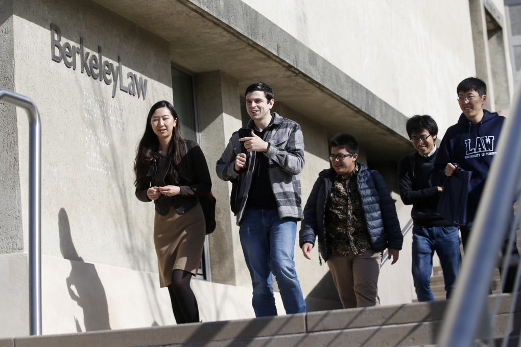 Students walk past a sign at UC Berkeley’s law school in Berkeley, California in 2020. Photo: Getty Images