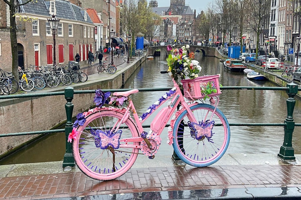Apart from Amsterdam’s canals, red-light district and museums, visitors to the Dutch capital can also look for other icons of the city, such as colourful flower bikes (above), historic gable stones and mini-libraries. Photo: Anne Pinto-Rodrigues