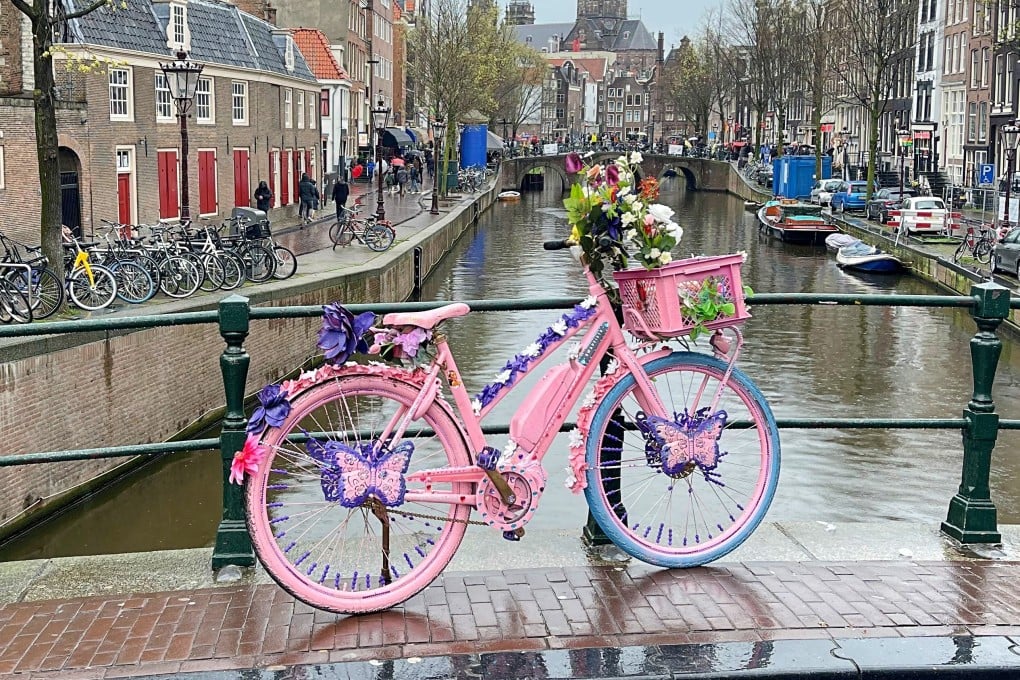 Apart from Amsterdam’s canals, red-light district and museums, visitors to the Dutch capital can also look for other icons of the city, such as colourful flower bikes (above), historic gable stones and mini-libraries. Photo: Anne Pinto-Rodrigues
