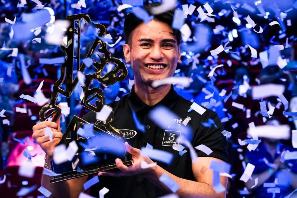 Robbie Capito holds the trophy after winning the UK Open Pool Championship. Photo: Matchroom Pool