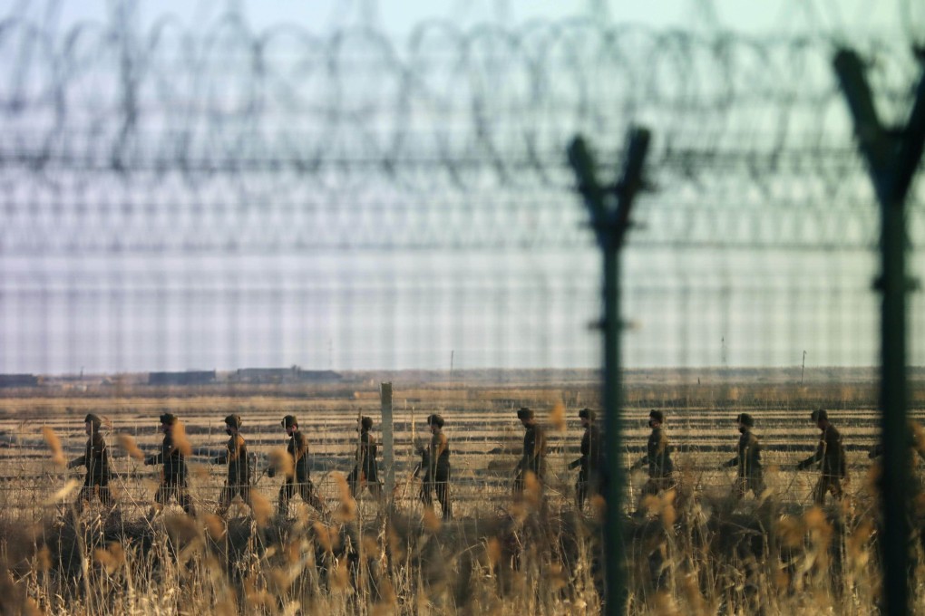 North Korean soldiers patrolling a border area with China. The isolated nation has boosted efforts to use cameras and facial recognition to track its population. Photo: Kyodo