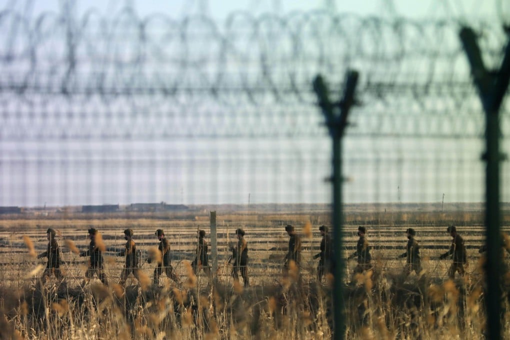 North Korean soldiers patrolling a border area with China. The isolated nation has boosted efforts to use cameras and facial recognition to track its population. Photo: Kyodo