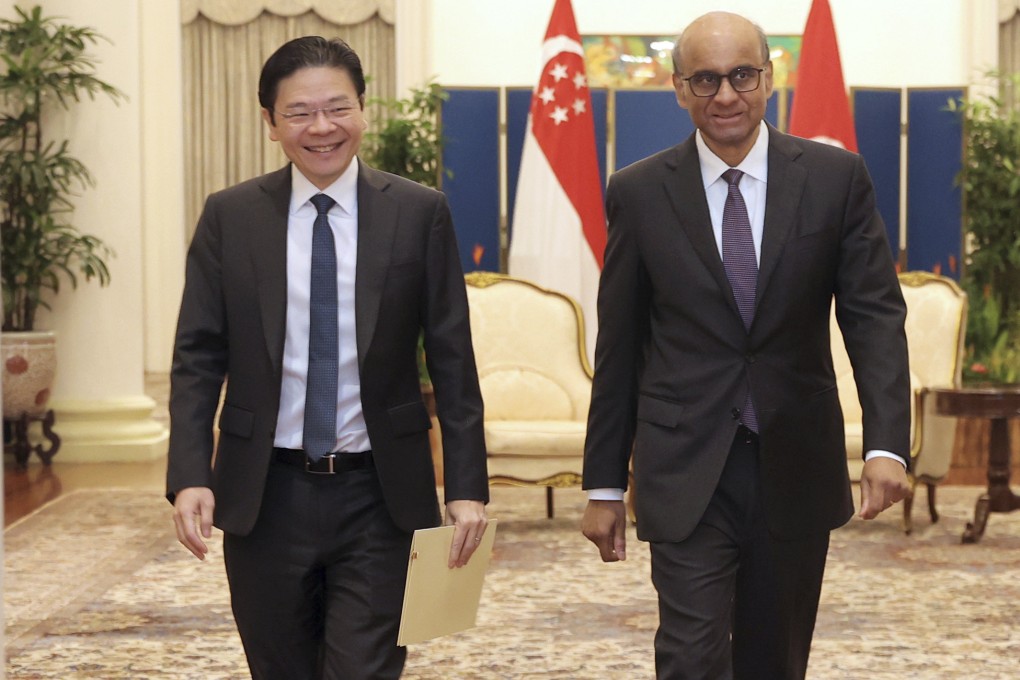 Lawrence Wong (left), Singapore’s incoming prime minister, pictured on Monday with Tharman Shanmugaratnam, the city state’s president. Photo: Singapore Ministry of Communications and Information via AP
