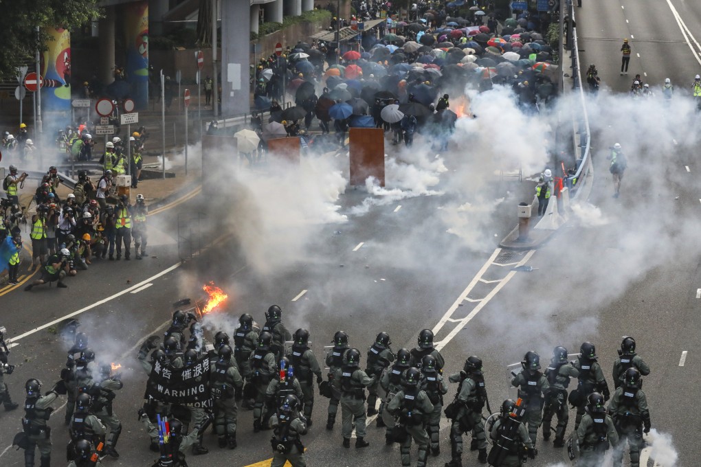 Riot police fire tear gas on protesters during a protest march in 2019. Bomb plot mastermind Wong Chun-keung continued to testify for the prosecution at the High Court on Tuesday. Photo: K. Y. Cheng
