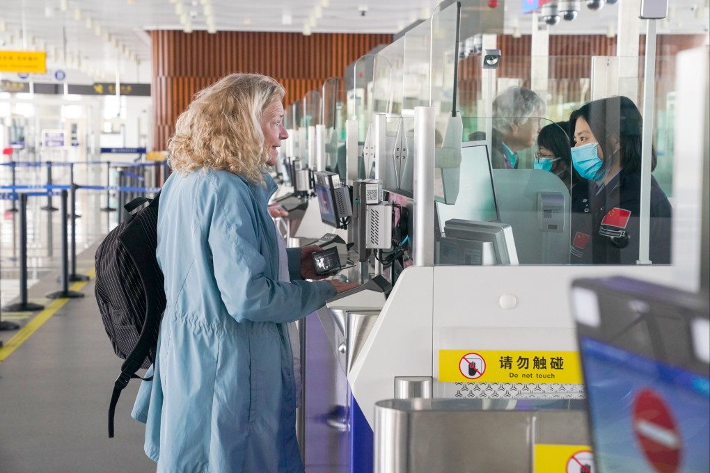 A cruise passenger goes through clearance procedures in Tianjin. China is now allowing visa-free entries for foreigners who arrive via cruises. Photo: Getty Images