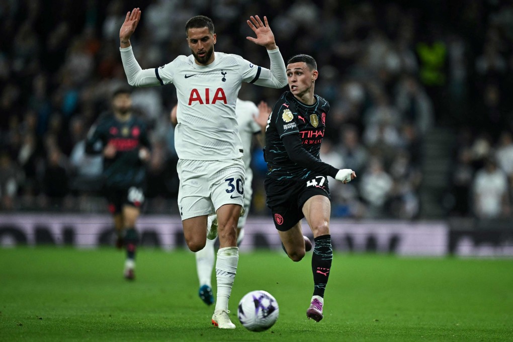 Tottenham were in the delicate position of knowing victory over Manchester City could help hand Arsenal the title. Photo: AFP