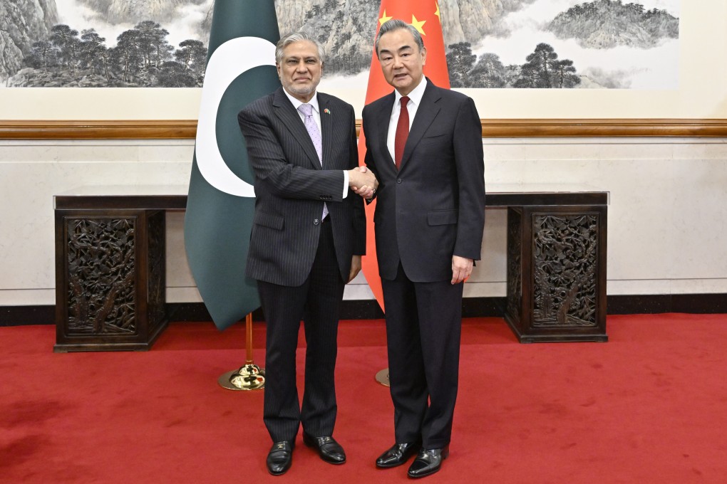 Ishaq Dar, Pakistan’s deputy prime minister (left), meets Wang Yi, China’s top diplomat, in Beijing on Wednesday. Photo: Xinhua