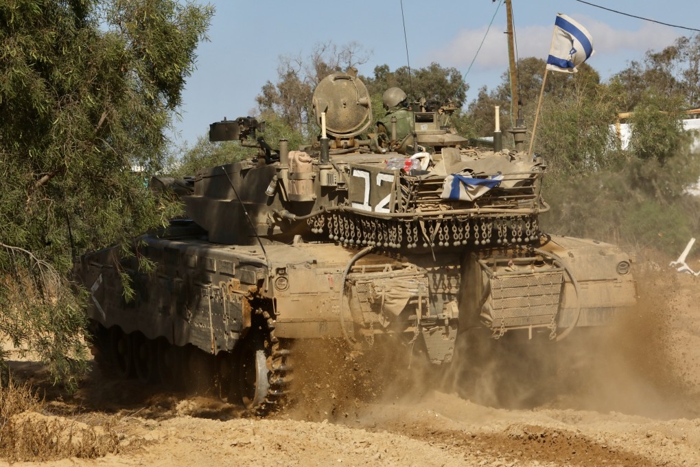 An Israeli tank is seen near the Shalom Kerem crossing in southern Israel, bordering the Gaza Strip. Photo: Xinhua