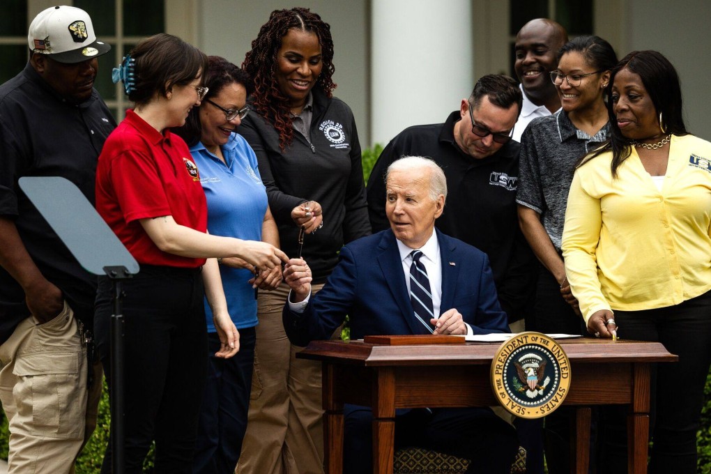 US President Joe Biden (centre) speaks to union workers after signing orders that increase tariffs on China during an event in the Rose Garden of the White House in Washington on May 14. Biden’s order raises tariffs on a wide range of Chinese imports, including semiconductors, batteries, solar cells and critical minerals in an election-year bid to bolster domestic manufacturing in critical industries. Photo: Bloomberg