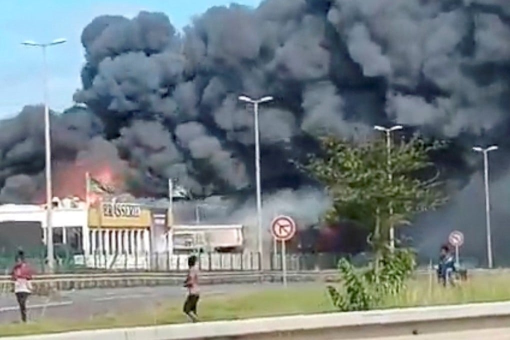 Smoke rises from a fire amid riots ine Noumea, New Caledonia, on Tuesday against plans to allow more people to take part in local elections in the French-ruled territory. Photo: Djelyna Lebonwacalie via Reuters