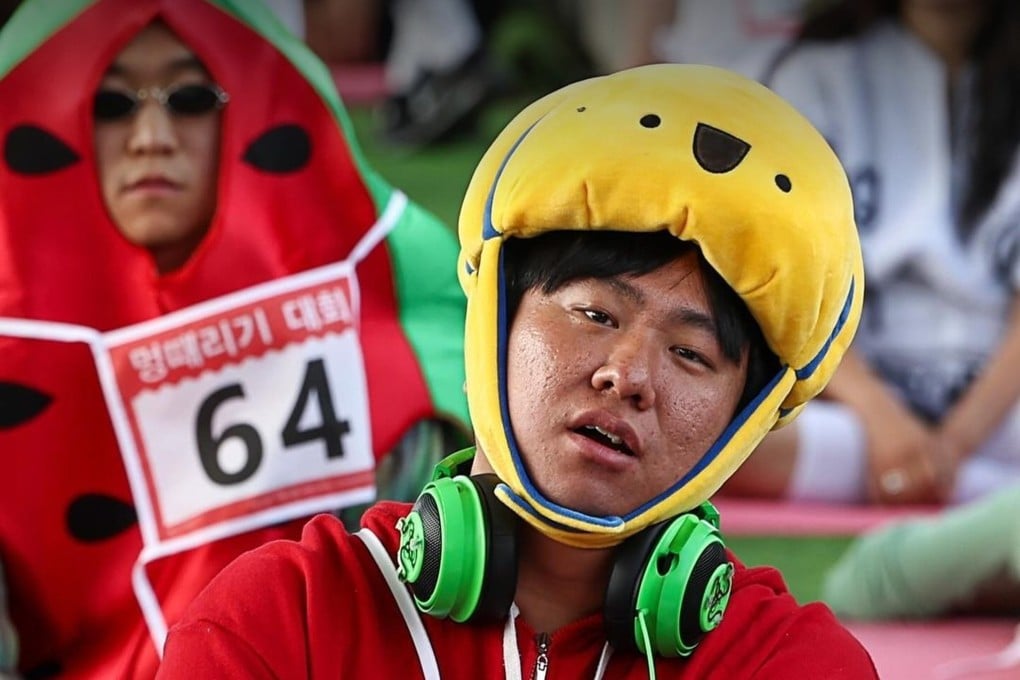 Participants In the Space-Out Competition held in Seoul, South Korea, on May 12. Participants sit still and say nothing for 90 minutes, giving them a chance to pause their busy lives and “space out”, according to its creator, artist Woopsyang. Photo: Instagram