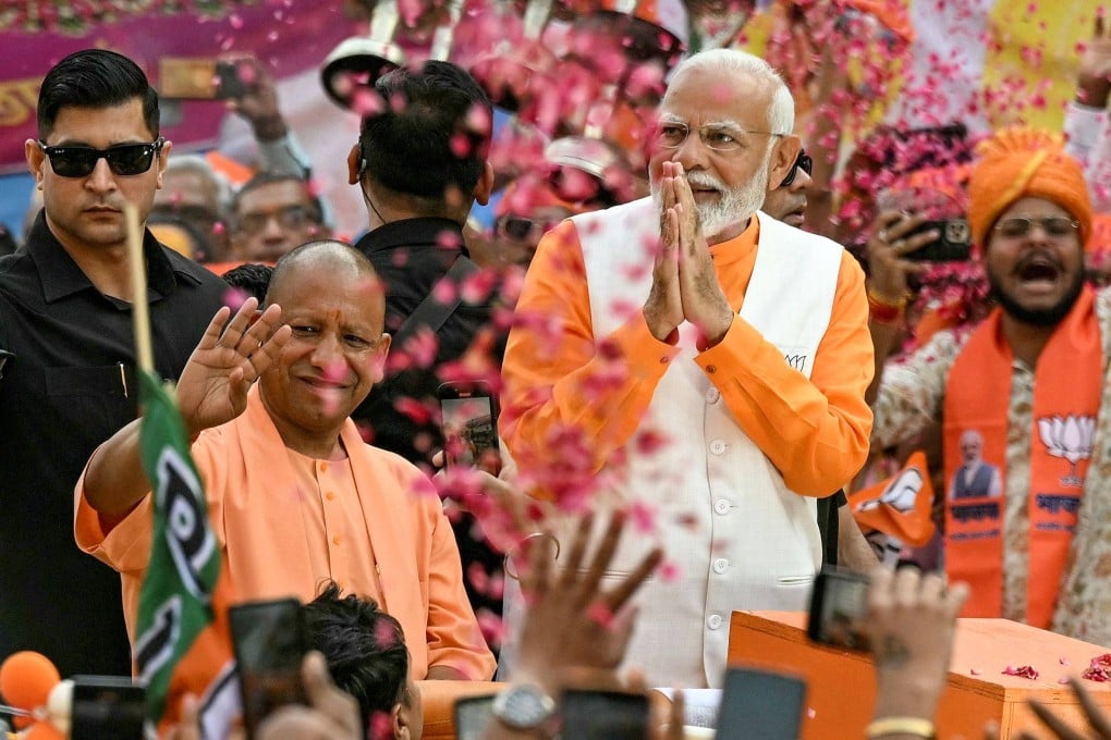 Indian Prime Minister Narendra Modi greets supporters during an election roadshow on Monday to rally votes from the Hindu faithful in Varanasi, one of India’s holiest cities. Photo: AFP