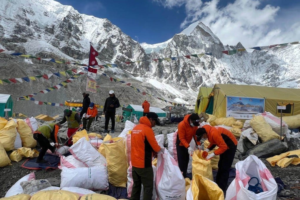 Team members of the Clean Mountain Campaign sort through trash at Everest Base Camp. Photo: Clean Mountain Campaign/Handout