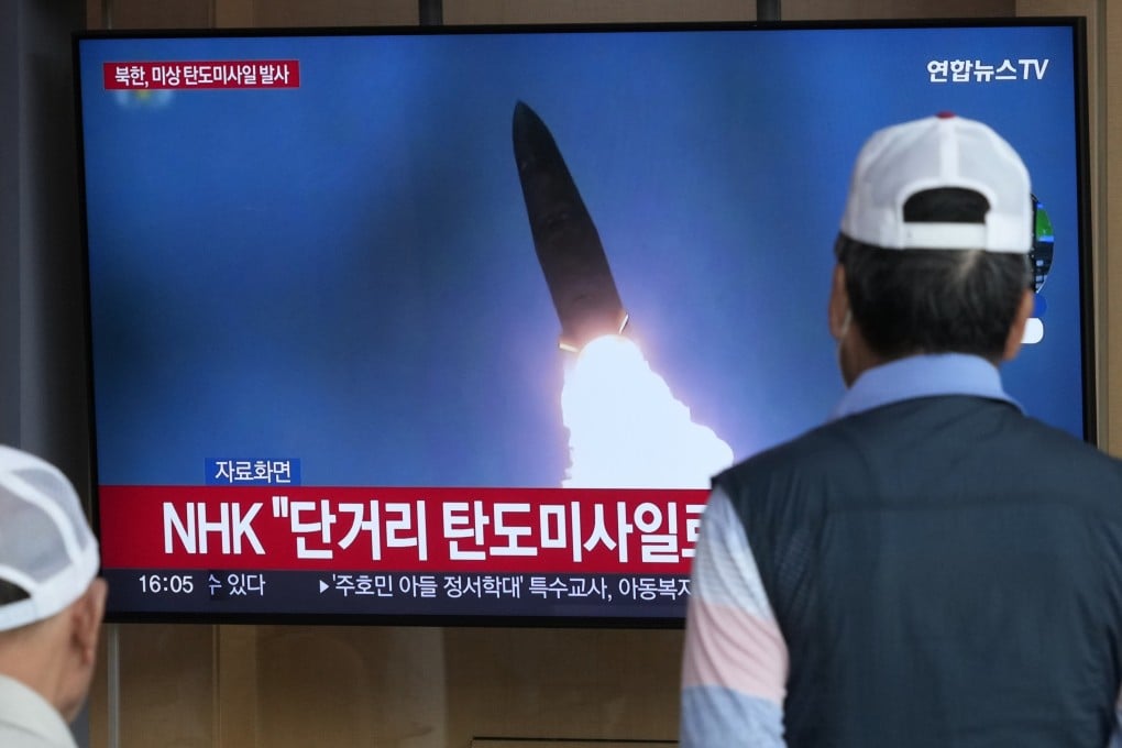A TV screen shows a file image of North Korea’s missile launch during a news program at the Seoul Railway Station in Seoul, South Korea on Friday. Photo: AP
