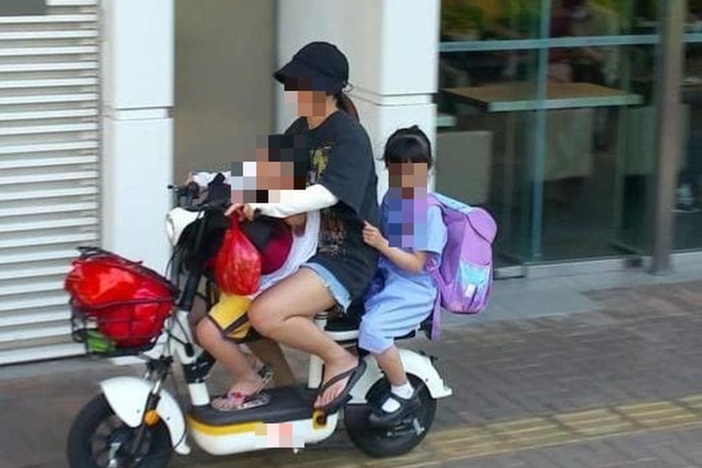 A woman was arrested for riding an e-bike with two children on the pavement. Photo: Hong Kong Police Force