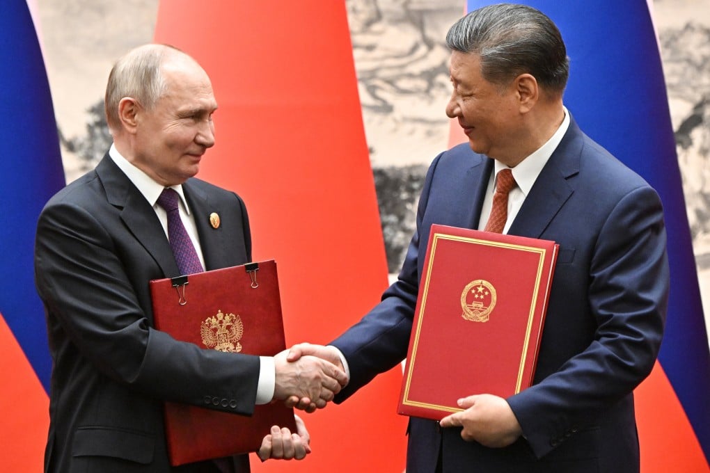 Russian President Vladimir Putin and Chinese President Xi Jinping at a signing ceremony at the Great Hall of the People in Beijing on Thursday. Photo: Sputnik, via EPA-EFE