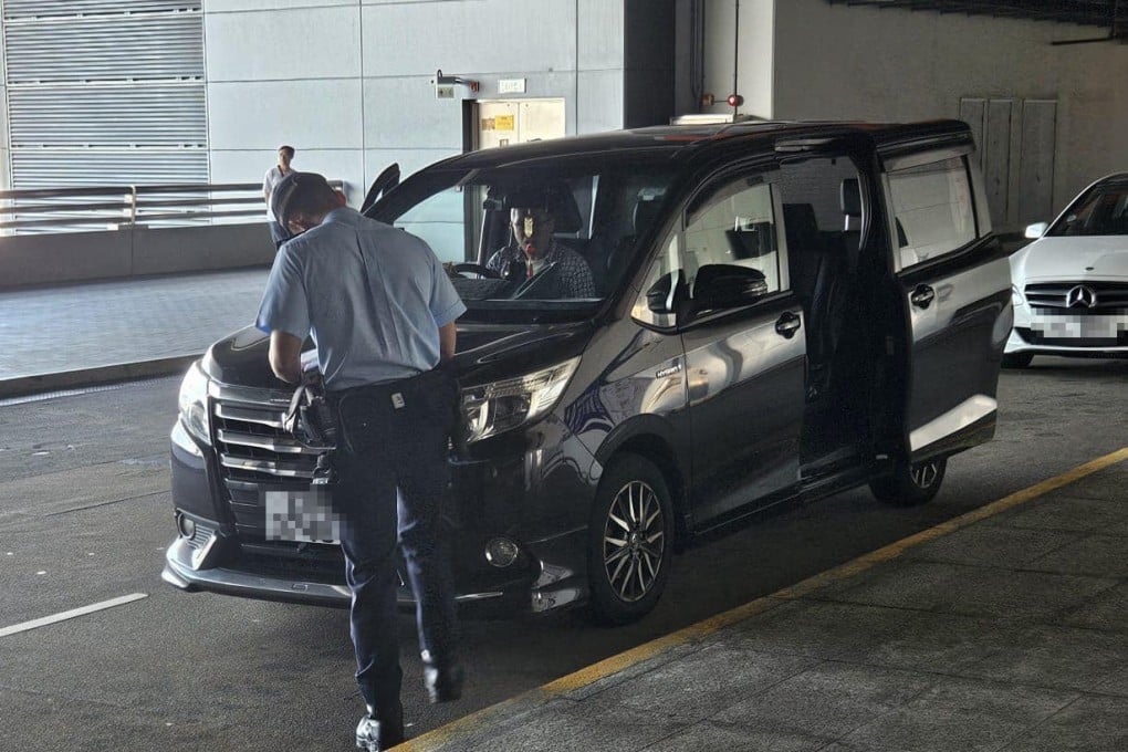 A screengrab of footage showing police inspecting a vehicle linked to allegations of illegal car-hire services. Photo: Facebook/Bosco Chu