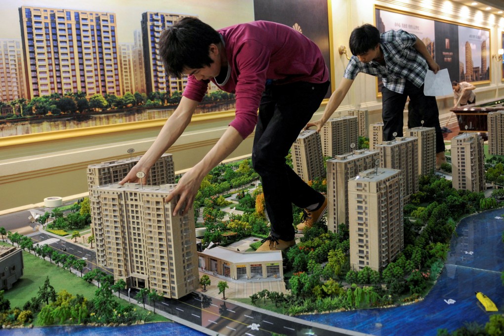 Model flats being set up at a real estate exhibition in eastern China. Beijing has highlighted how a healthy property market is linked to social wellness and economic development. Photo: Reuters