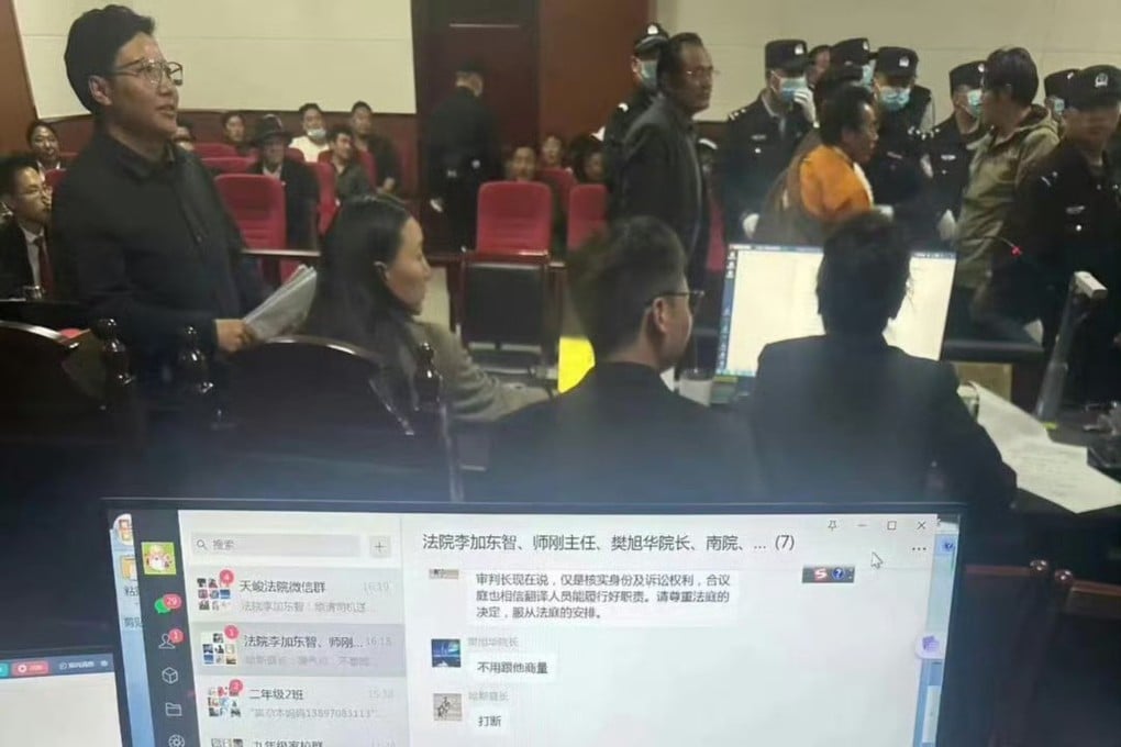 A photo taken by a lawyer during a trial in Qinghai province appears to show a judge receiving real-time instructions from his supervisors. Photo: Weibo