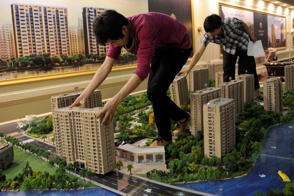 Model flats being set up at a real estate exhibition in eastern China. Beijing has highlighted how a healthy property market is linked to social wellness and economic development. Photo: Reuters