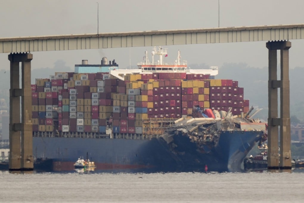 Tugboats escort the cargo ship Dali after it was refloated in Baltimore on Monday. Photo: AP