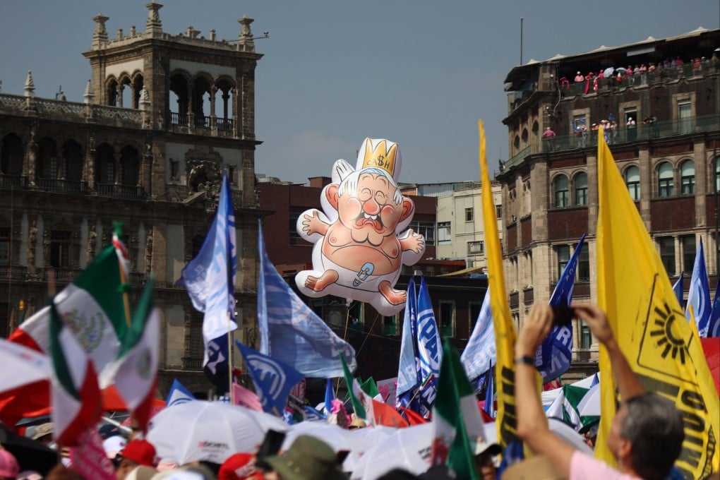 A balloon depicting Mexico’s President Andres Manuel Lopez Obrador at a protest in Mexico City’s Zocalo Square on Sunday. Photo: Reuters