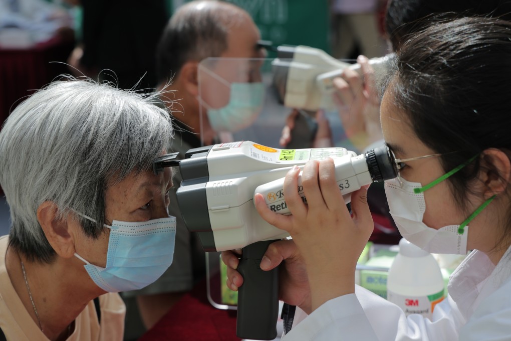 Free eye checks are provided at the “Health In Sight” exhibition organised by the Chinese University of Hong Kong’s Medical Society in Ma On Shan on October 15, 2022. Photo: Jelly Tse