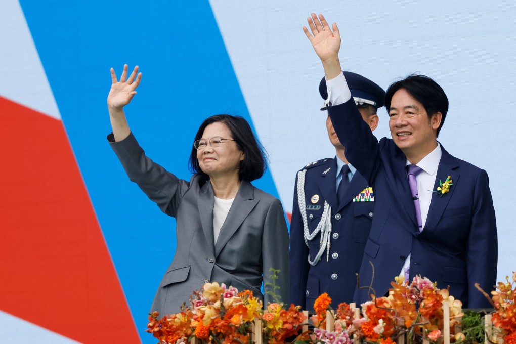 Taiwan’s former president Tsai Ing-wen and new President William Lai Ching-te wave during the inauguration ceremony outside the presidential office building in Taipei on Monday, May 20. Photo: Reuters