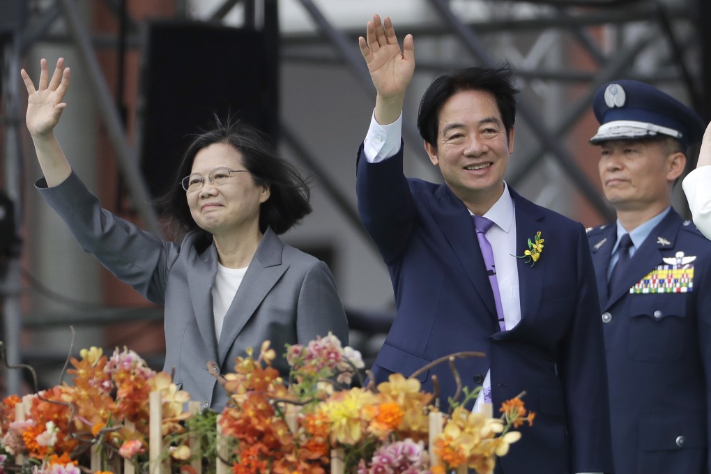 Taiwan’s new leader William Lai (right) and former president Tsai Ing-wen wave during the inauguration ceremony in Taipei on Monday. Photo: AP
