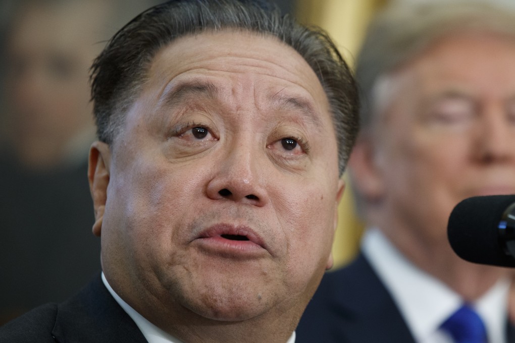 Broadcom CEO Hock Tan speaks during an event to announce the company is moving its global headquarters to the United States, in the Oval Office of the White House in November 2017. Photo: AP