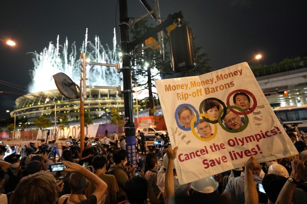 Demonstrators staged a protest against the Tokyo 2020 Olympic Games outside the National Stadium during the opening ceremony. Photo: EPA-EFE