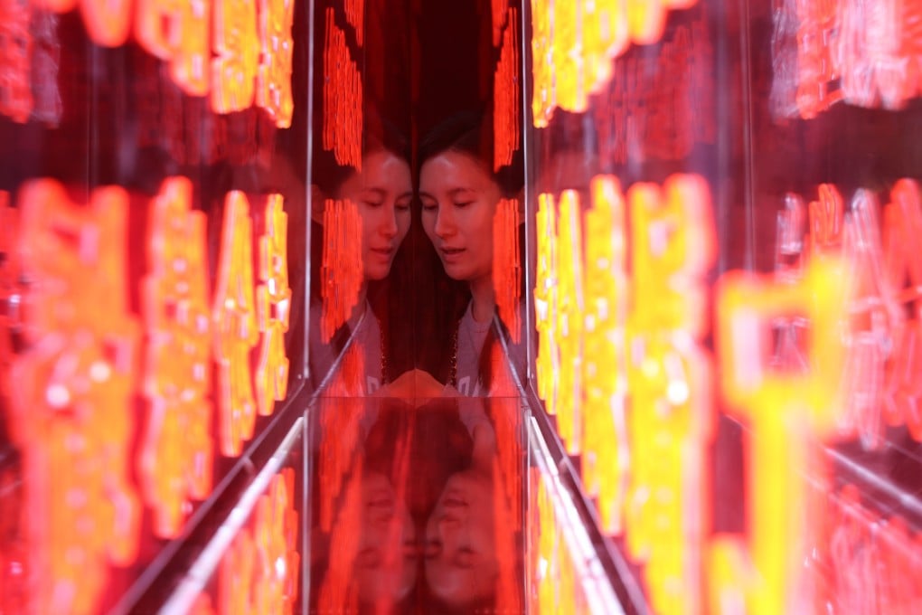 An exhibition was held in December last year to raise public awareness of fraud prevention. The exhibition showcases artwork adapted from tactics used in love scams, phishing attempts and other types of swindles. Photo: Edmond So