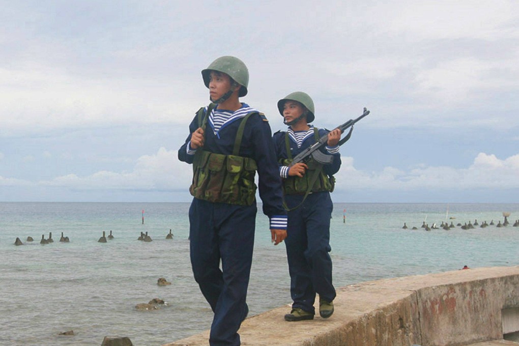 Vietnamese sailors patroling on Phan Vinh Island in the Spratly archipelago. Photo: AFP