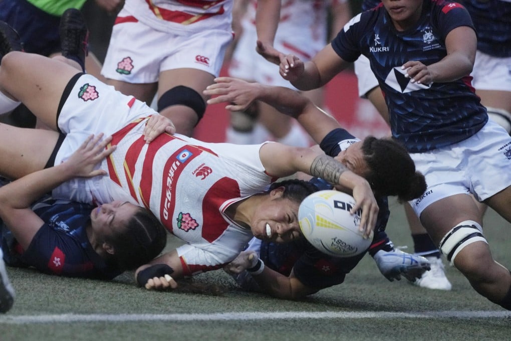 Japan’s Mele Kagawa reaches over to ground the ball for her side’s first try in their Asia Rugby Championship win over Hong Kong at King’s Park. Photo: Elson Li